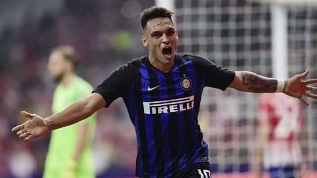 Penyerang Inter Milan, Lautaro Martinez, melakukan perayaan setelah membobol gawang Atletico Madrid. (Foto: Javier Soriano/AFP)