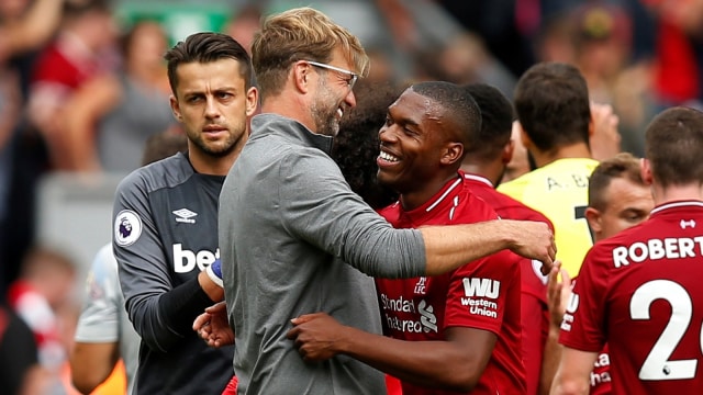 Juergen Klopp merayakan kemenangan. (Foto: REUTERS/Andrew Yates)