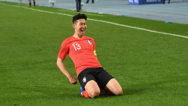 Son Heung-min di uji tanding melawan Honduras. (Foto: Jung Yeon-je / AFP)