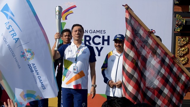 Suasana Kirab Obor Asian Games di Bali. (Foto: ANTARA/Wira Suryantala)