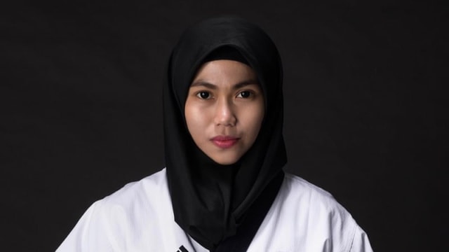 Defia Rosmaniar, Atlet Berhijab yang Berprestasi 