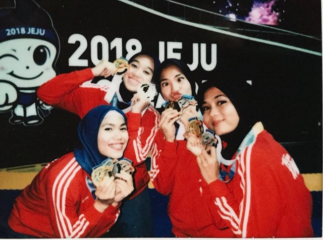 Defia Rosmaniar, Atlet Berhijab yang Berprestasi  (1)