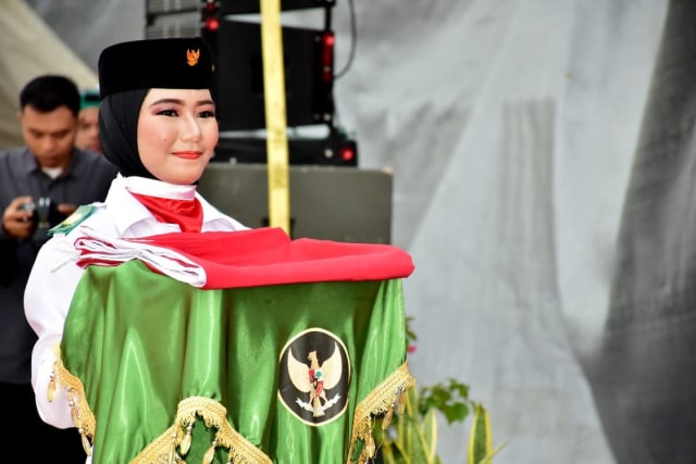 Marlina, siswi berprestasi yang terpilih menjadi pembawa bendera  (Foto: Pupuk Indonesia)