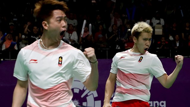 Marcus Gideon/Kevin Sanjaya membela Indonesia di nomor beregu putra cabang olahraga bulu tangkis Asian Games 2018. (Foto: Hadi Abdullah/Antara/INASGOC)