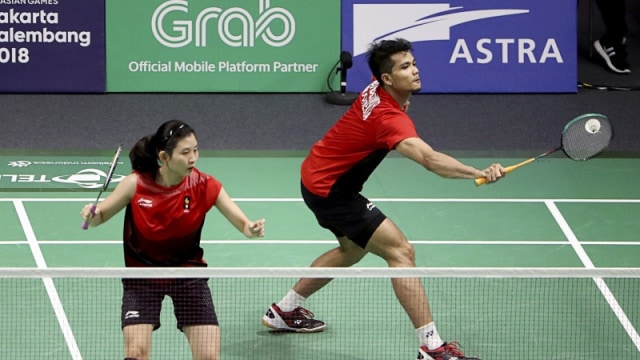Debby (kiri) dan Ricky (kanan) kala berlaga di Asian Games 2018. (Foto: ANTARA FOTO/INASGOC/Jessica Margaretha)