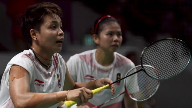 Apriyani (kiri) dan Greysia (kanan) di Asian Games 2018. (Foto: ANTARA FOTO/INASGOC/Puspa Perwitasari)