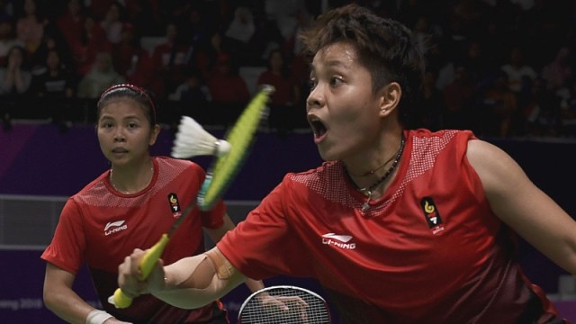 Greysia (kiri) dan Apriyani (kanan) pada laga di Asian Games 2018. (Foto: ANTARA FOTO/INASGOC/Puspa Perwitasari)
