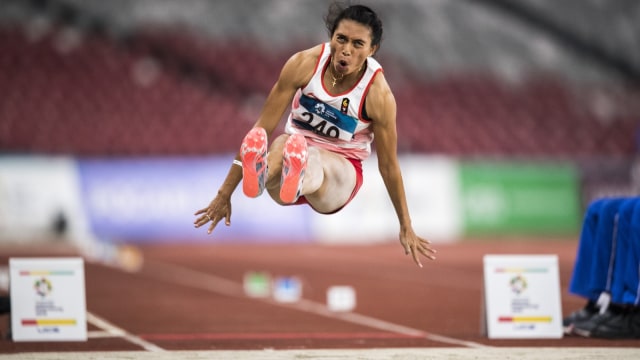 Maria Londa menjalani final nomor lompat jauh. Foto: M. Agung Rajasa/Antara/INASGOC