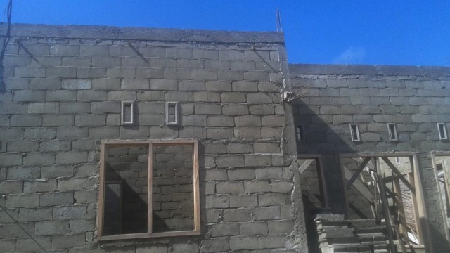 Bantuan bedah rumah dari Dana Desa untuk keluarga Rio Rizky Darmawan. Foto: Dok. Kemensos