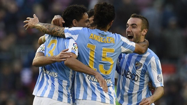 Malaga musim 2014/15 saat menjadi 'nemesis' bagi Barcelona. (Foto: AFP/Lluis Gene)