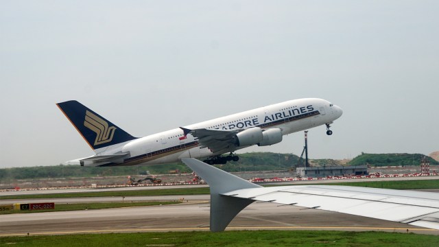 Pesawat Singapore Airlines di bandara Changi Singapura. (Foto: Aditia Noviansyah/kumparan)