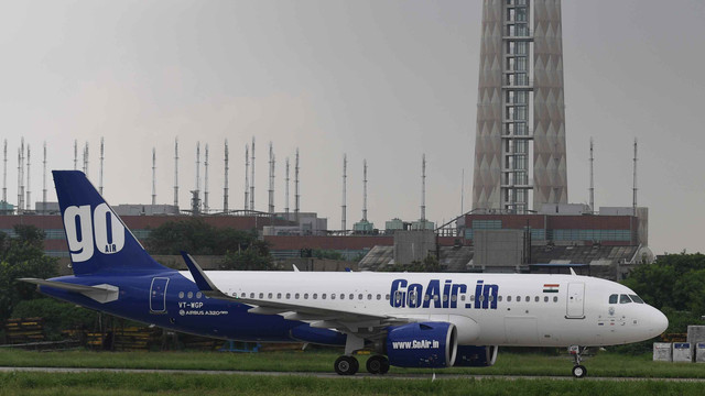Ilustrasi GoAir (Foto: Sajjad HUSSAIN / AFP)