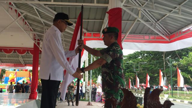 Pawai Merah-Putih HUT TNI di Banda Aceh (Foto: Zuhri Noviandi/kumparan)