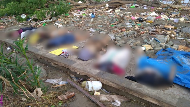 Korban gempa dan tsunami di Palu, Sulawesi Tengah. (Foto: AFP/OLA GONDRONK)