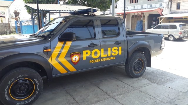 Mobil milik Polsek Cisurupan yang sempat dirusak Sadan di Lebaran tahun 2017 (Foto: Dok. Iqbal Gozali)
