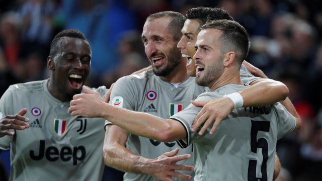 Pemain Juventus rayakan gol kedua di laga melawan Udinese. (Foto: REUTERS/Stefano Rellandini)