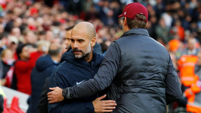 Josep Guardiola dan Juergen Klopp di laga Liverpool vs Manchester City. (Foto: REUTERS/Phil Noble)