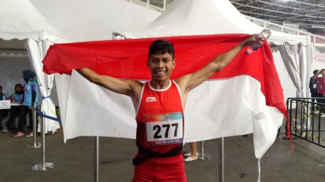 Sapto Yogo Purnomo usai mempersembahkan emas untuk Indonesia. (Foto: Aditia Rijki Nugraha/kumparan)