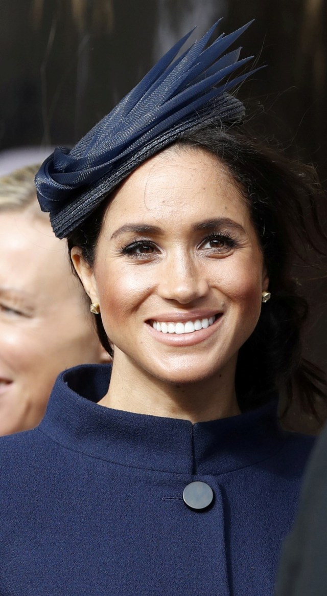 Meghan Markle di pernikahan Putri Eugenie. (Foto: Alastair Grant/Pool via REUTERS)