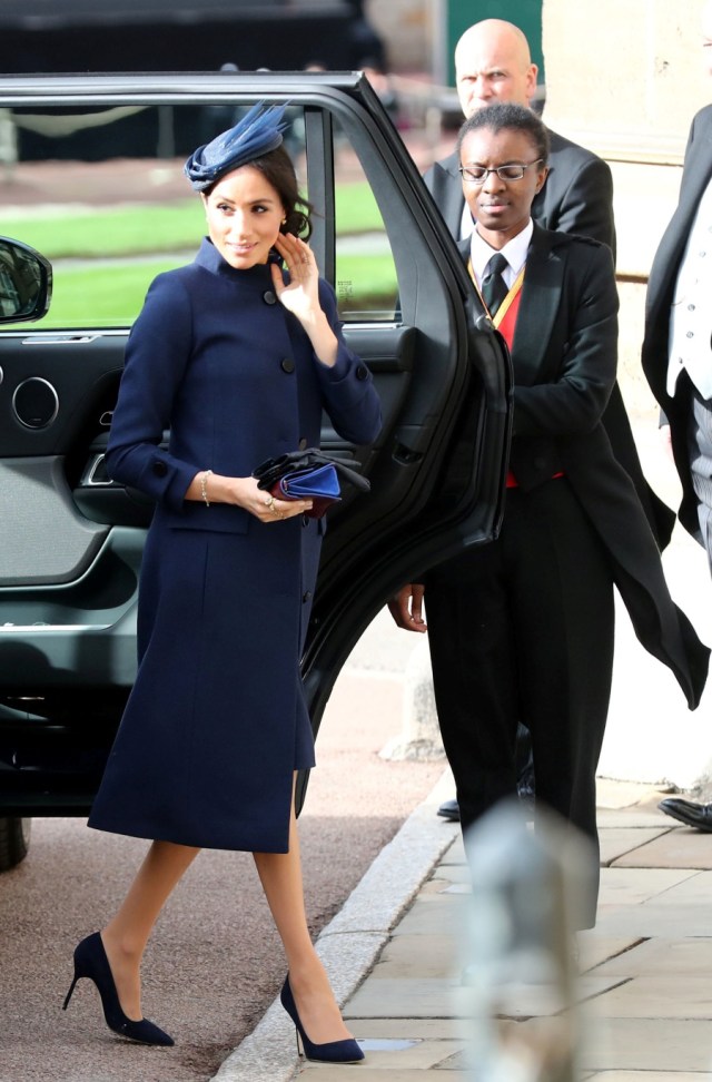 Meghan Markle kenakan Givenchy di pernikahan Putri Eugenie. (Foto: Gareth Fuller/Pool via REUTERS)
