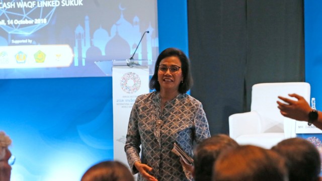 Menteri Keuangan Sri Mulyani Indrawati menjadi pembicara kunci dalam Forum Ekonomi Syariah di Pertemuan Tahunan IMF-World Bank di Nusa Dua Bali, Minggu (14/10/2018).  Foto: ANTARA FOTO/Wisnu Widiantoro