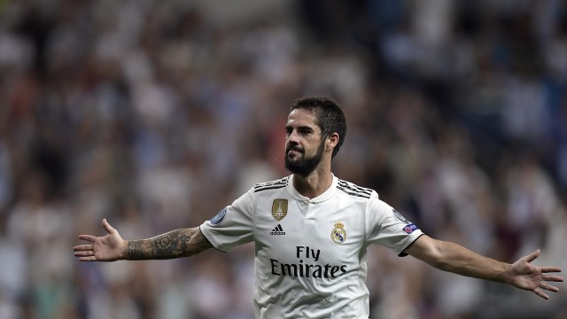 Julen Lopetegui merayakan gol Real Madrid ke gawang AS Roma. (Foto: Oscar Del Pozo/AFP)