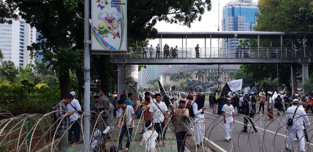 Massa mulai berkumpul di Patung Kuda, Jumat (2/11/2018). (Foto: Fadjar Hadi/kumparan)