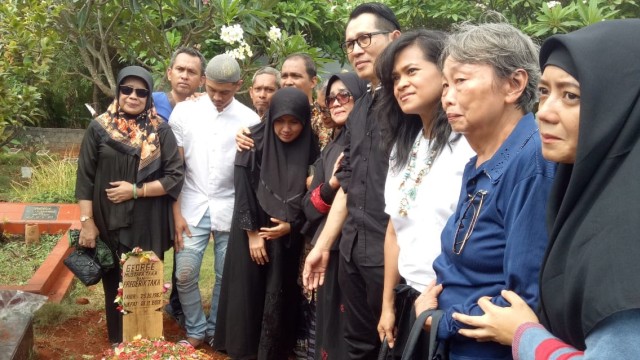 Suasana pemakaman George Taka. (Foto: Ainul Qalbi/kumparan)