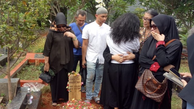 Suasana pemakaman George Taka. (Foto: Ainul Qalbi/kumparan)
