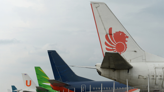 Deretan pesawat di Bandara Soekarno-Hatta di Tangerang. (Foto: AFP PHOTO / Adek Berry)