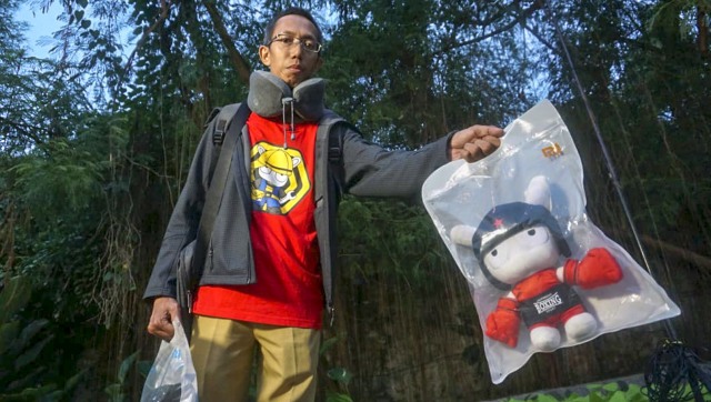 Anggota Mi Fans, Mohamad Ismail dengan koleksinya (Foto: Helmi Afandi Abdullah/kumparan)