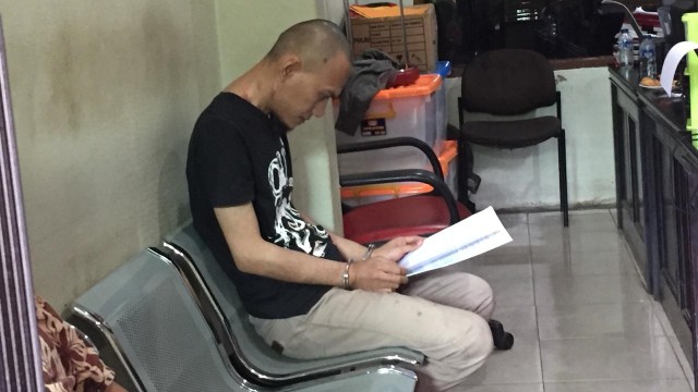 Rohandi sebelum dipindah ke Polres Metro Jakarta Utara. (Foto: Darin Atiandina/kumparan)