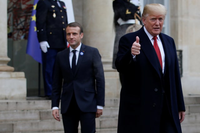 Macron dan Trump di Peringatan 100 tahun berakhirnya Perang Dunia I (Foto: Reuters/Philippe Wojazer/Pool)
