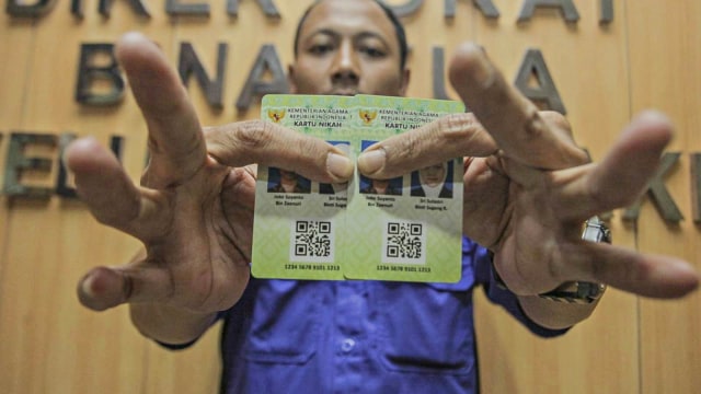 Ilustrasi kartu nikah. Foto: ANTARA FOTO/Muhammad Adimaja