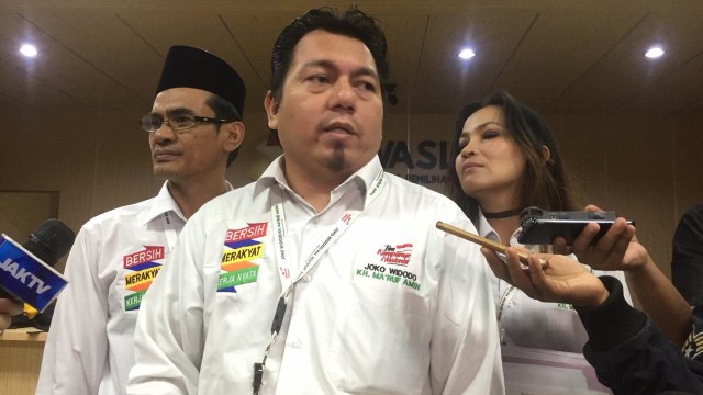 Direktur Advocat dan Hukum TKN Ade Irfan Pulungan (tengah). (Foto: Mirsan Simamora/kumparan)