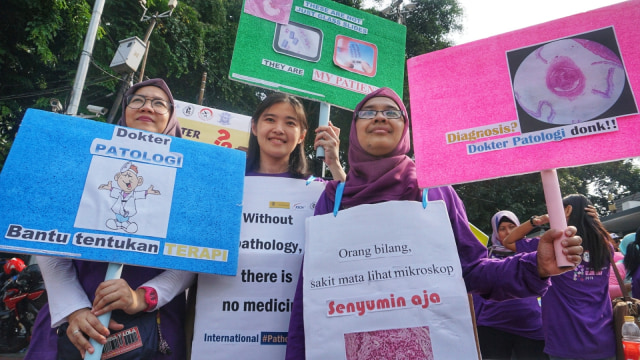 Peringatan Hari Patologi Internasional di kawasan Hari Bebas Kendaraan Bermotor, Bundaran Hotel Indonesia, Jakarta. (Foto: Jamal Ramadhan/kumparan)