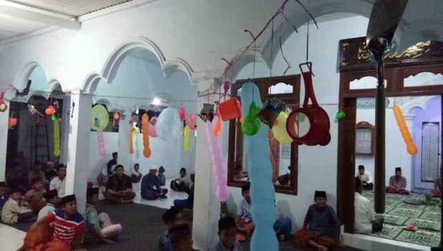 Tradisi Rebutan Alat Dapur dalam Perayaan Maulid Nabi Muhammad