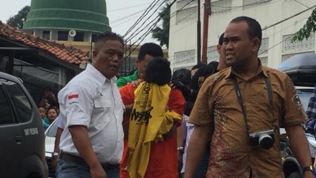 Tersangka pembunuh pemandu karaoke. (Foto: Raga Imam/kumparan)