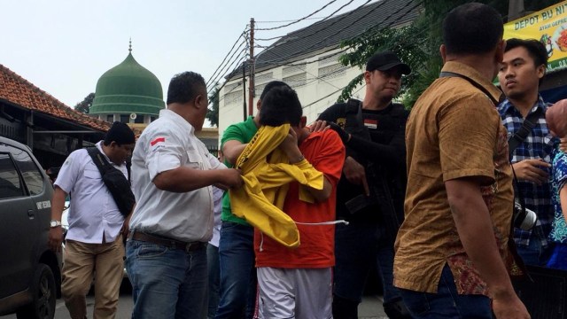 Tersangka pembunuh pemandu karaoke. (Foto: Raga Imam/kumparan)