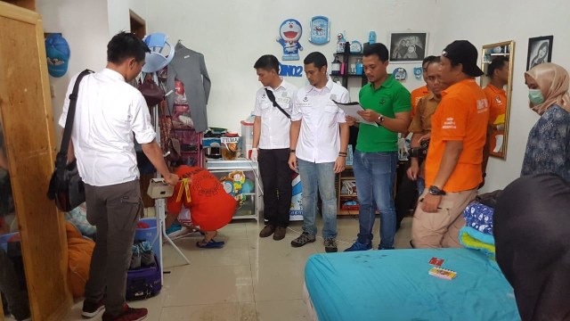 Rekonstruksi pembunuhan pemandu karaoke, Jumat (23/11/2018). (Foto: Raga Imam/kumparan)