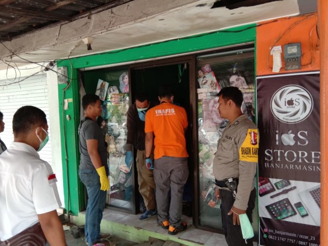 Polisi tampak berada di tempat kejadian perkara. (Foto: banjarhits.ID)