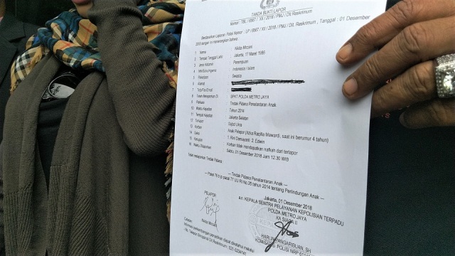 Surat laporan milik Nikita Mirzani. (Foto: Maria Gabrielle Putrinda/kumparan)