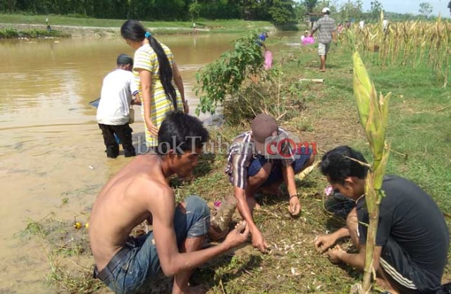 'Munggut' Warga Serbu Kali Kening
