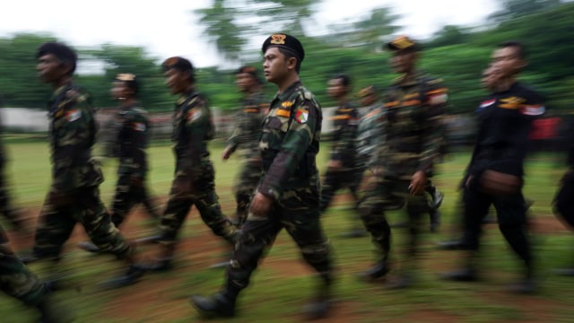 Ribuan Banser mengikuti acara 'Apel Kebangsaan dan Kemah Kemanusiaan' di Bumi Perkemahan Ragunan Jakarta Selatan, Selasa (18/4/2017). Foto: Aditia Noviansyah/kumparan