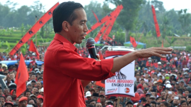 Joko Widodo saat berkampanye di Malang pada 30 Maret 2014. (Foto: AFP PHOTO/AMAN ROCHMAN )
