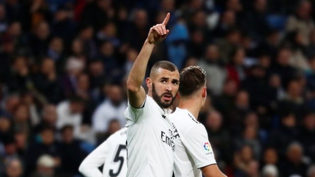 Benzema mencetak gol untuk Real Madrid. (Foto: REUTERS/Juan Medina)