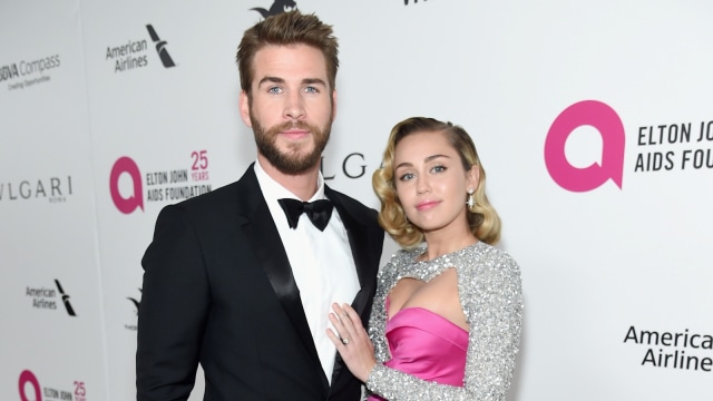 Liam Hemsworth dan Miley Cyrus. (Foto: Jamie McCarthy / GETTY IMAGES NORTH AMERICA / AFP)