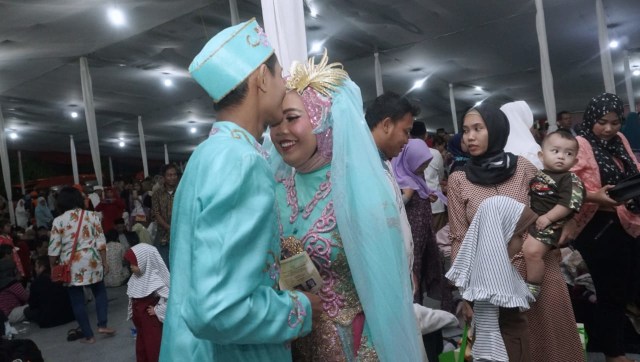 Suasana nikah massal di Thamrin 10, Jakarta. Foto: Fanny Kusumawardhani/kumparan
