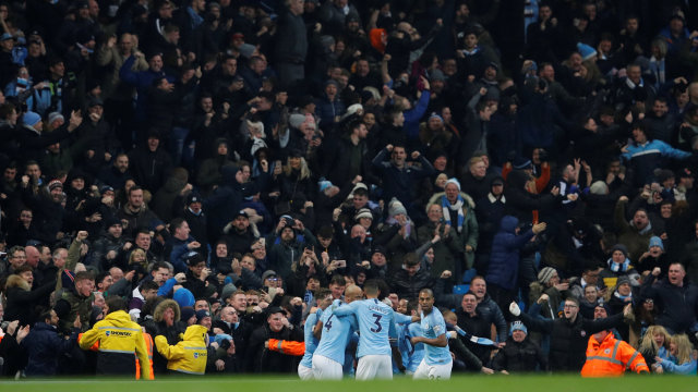 Selebrasi pemain City. (Foto: REUTERS/Phil Noble)