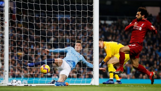 Sapuan John Stones di gawang Manchester City. Foto: Phil Noble/Reuters